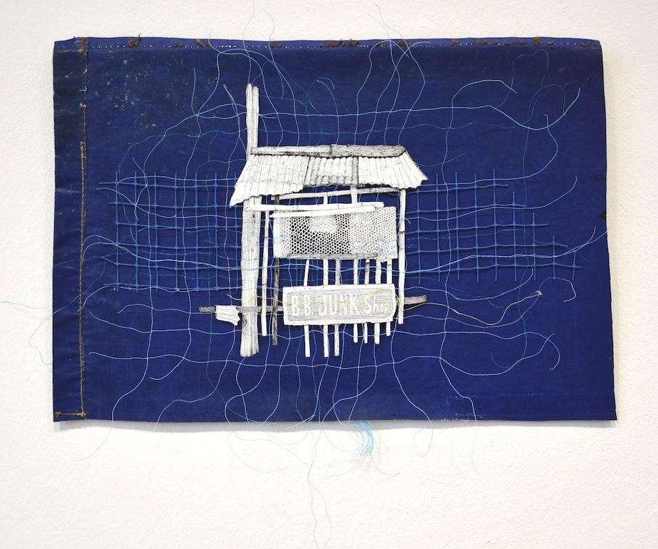 Assemblage sur bâche de camion, dessin et fil de pêche